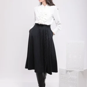JUPE MIDI ÉVASÉE AVEC POCHES